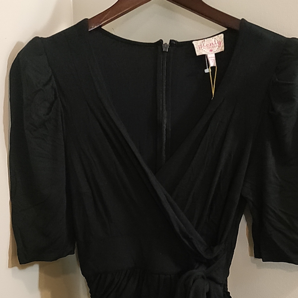 Tight black ruched dress